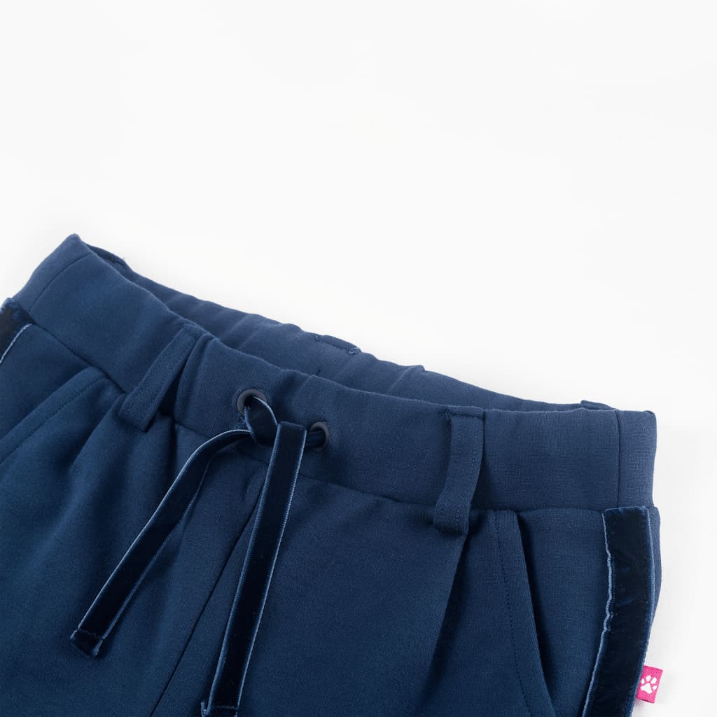 Pantalon enfant bleu marine avec liserés décoratifs noirs 128