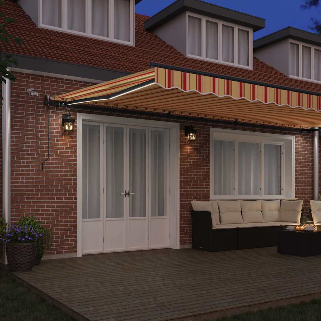 Einziehbare Markise mit Gelb und Orange 600 x 350 cm Stoff