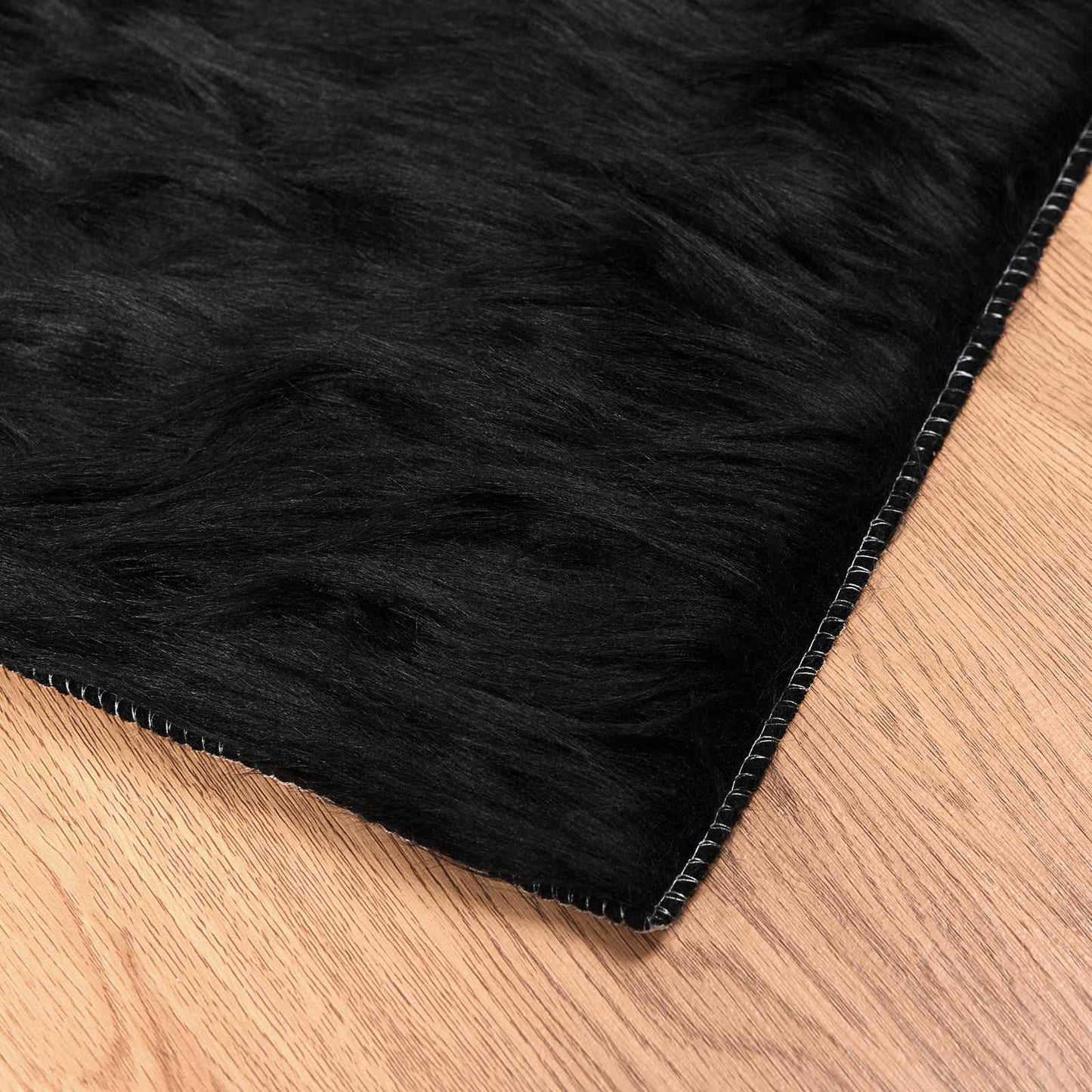Kunstschaffell Teppich Tafalla Schwarz 80 x 150 cm Polyester