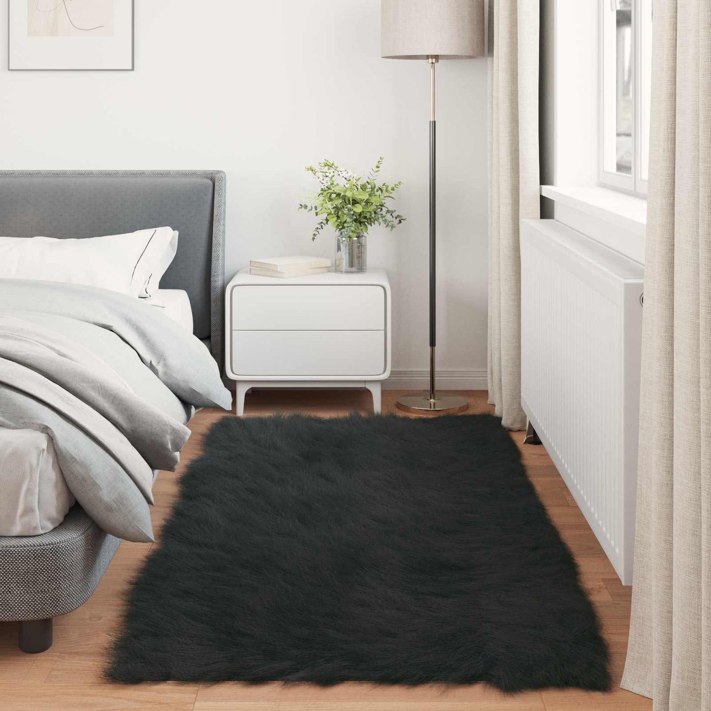 Tapis en fausse fourrure de mouton Tafalla Noir 100 x 200 cm Polyester