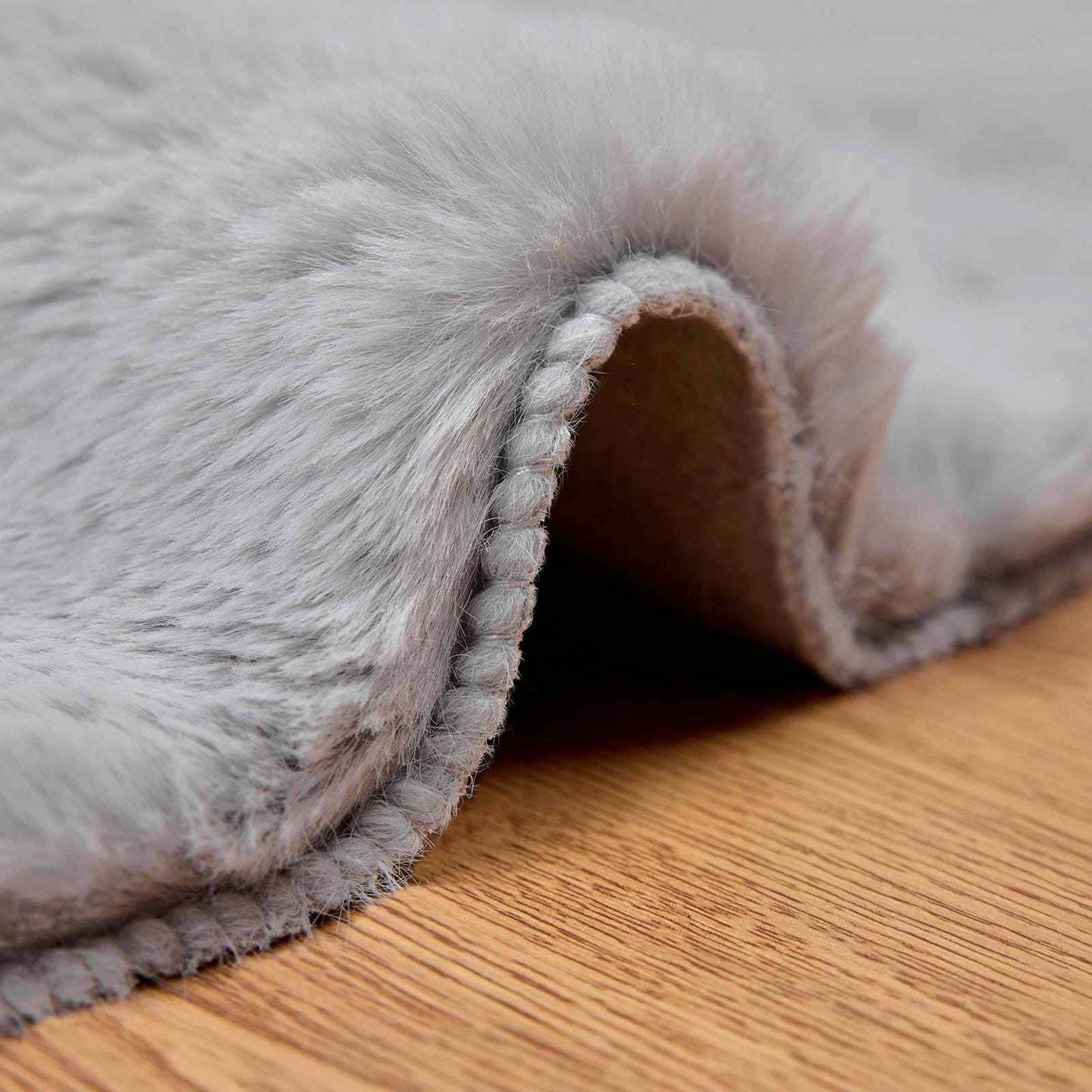 Tapis lapin en fausse fourrure Olite gris Ø 120 cm polyester