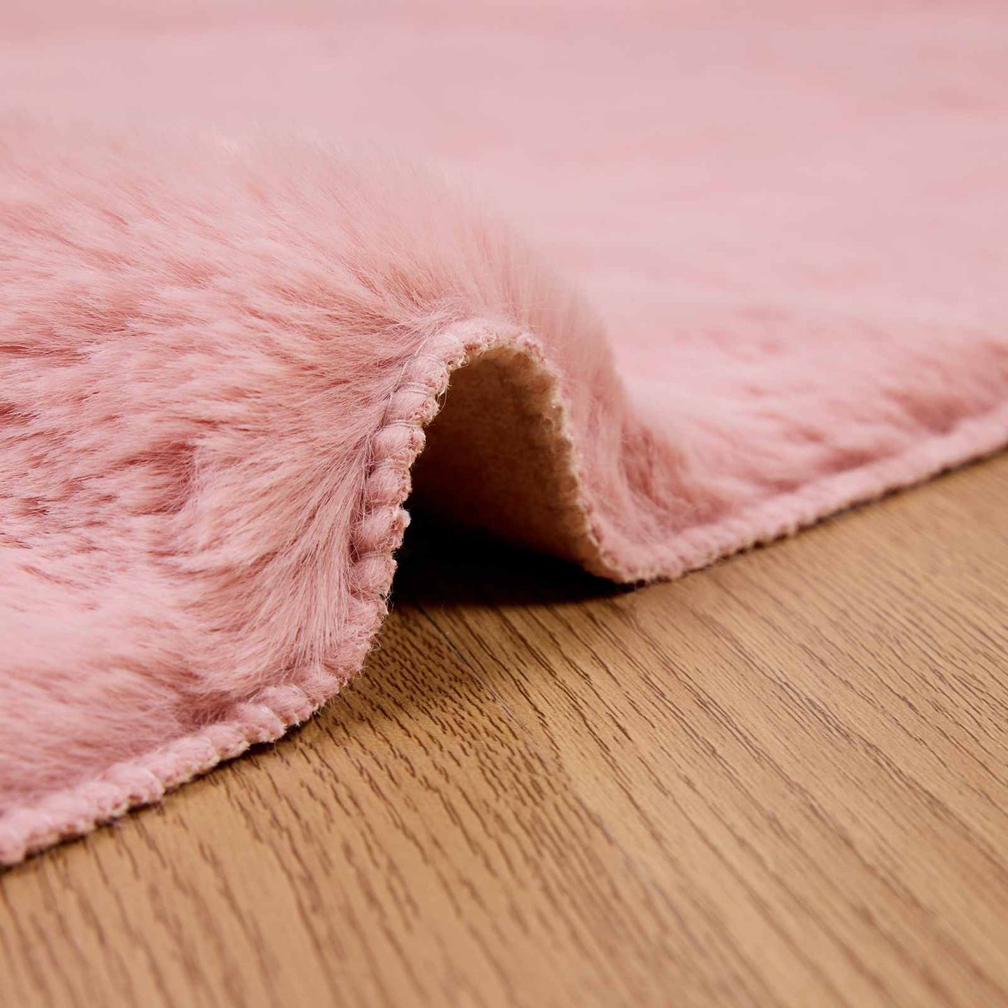 Tapis en fausse fourrure lapin Olite rose 80 x 200 cm polyester