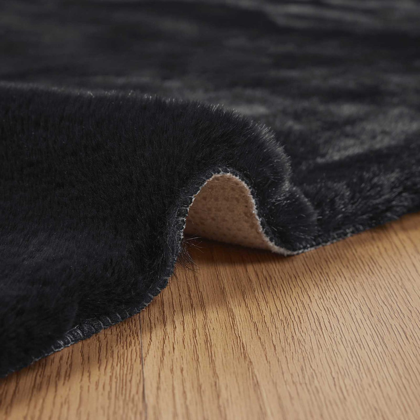 Kunstfell Hasen Teppich Olite Schwarz 80 x 200 cm Polyester