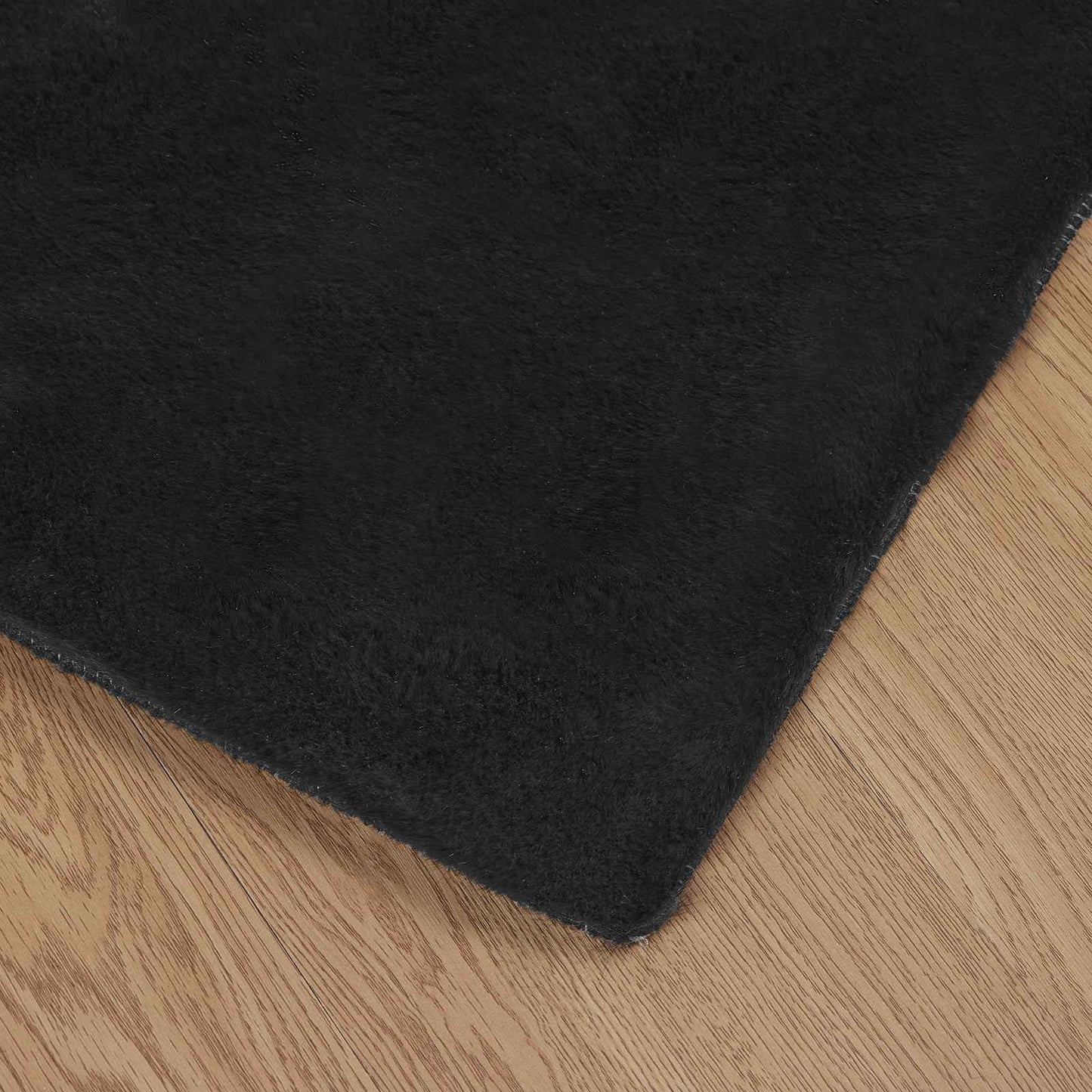 Kunstfell Hasen Teppich Olite Schwarz 80 x 200 cm Polyester