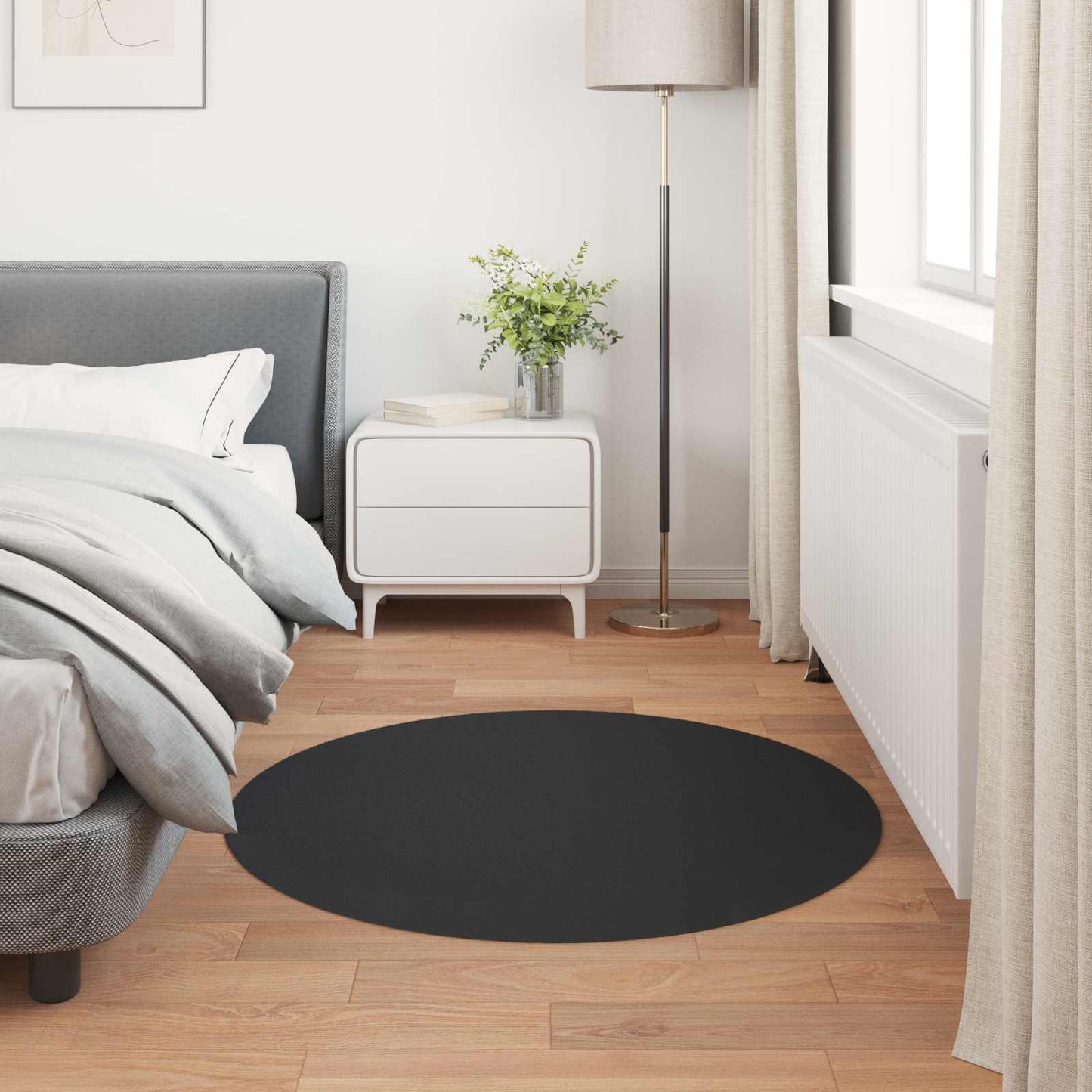 Tapis en fausse fourrure lapin Olite noir Ø 100 cm polyester